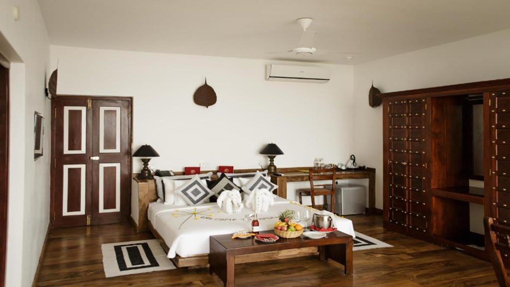 Classic Deluxe Zimmer im Thaulle Ayurveda Resort mit großzügigem Wohnbereich