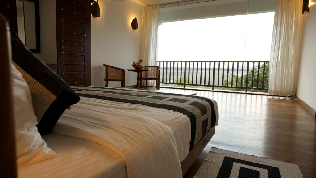 Superior Zimmer im Thaulle Ayurveda Resort mit Balkon und Blick ins Gruene